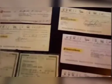 Imagem ilustrativa da imagem Dois homens são presos com mais de 100 cheques falsos