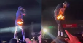 Imagem ilustrativa da imagem Short de Djonga é atingido por fogo durante show e cantor fica só de cueca no palco