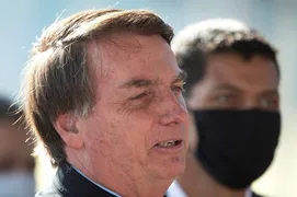 Imagem ilustrativa da imagem Bolsonaro é cobrado por apoiadores e rebate em tom de intimidação