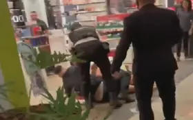 Imagem ilustrativa da imagem Arma de guarda civil dispara durante briga em shopping